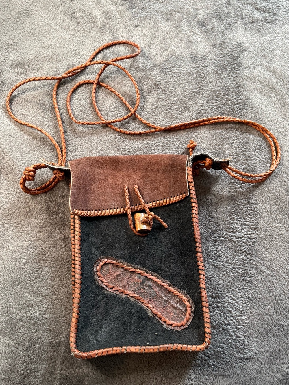 Handcrafted Brown and Black LeathernCrossbody Pouchs.